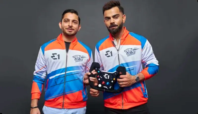 Virat Kohli and Adi Mishra with a RaceBird controller